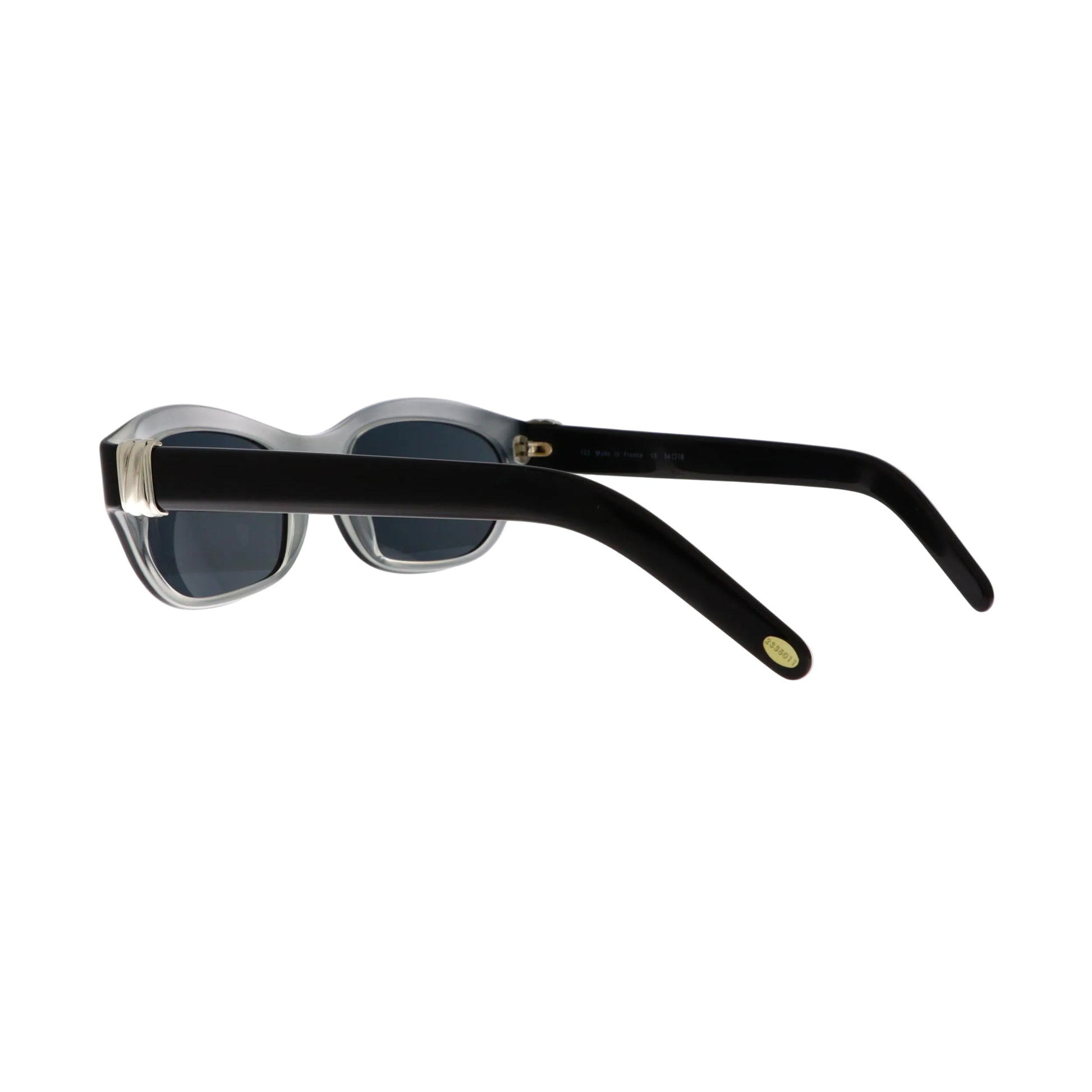 Cartier sunglasses with black frames and silver accents, featuring sleek, modern design and tinted lenses.