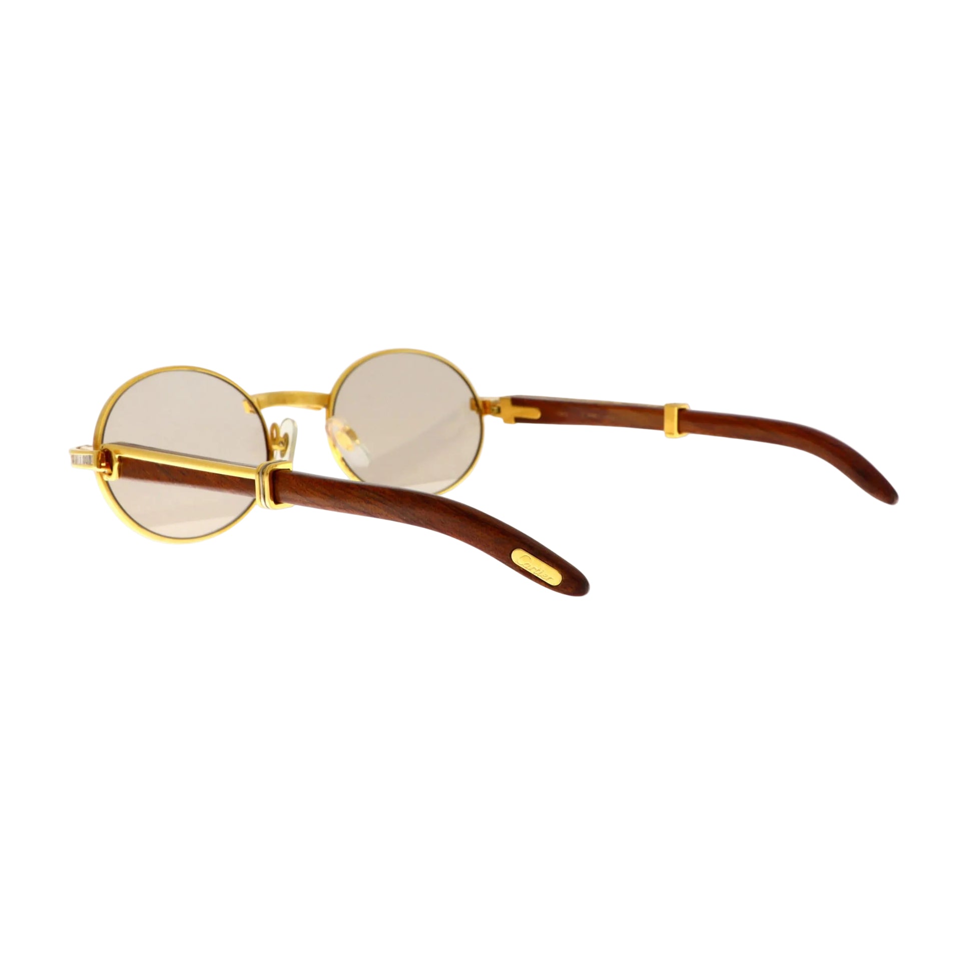 Cartier Must de Giverny sunglasses with gold frames and diamond accents, showcasing a stylish and luxurious eyewear design.