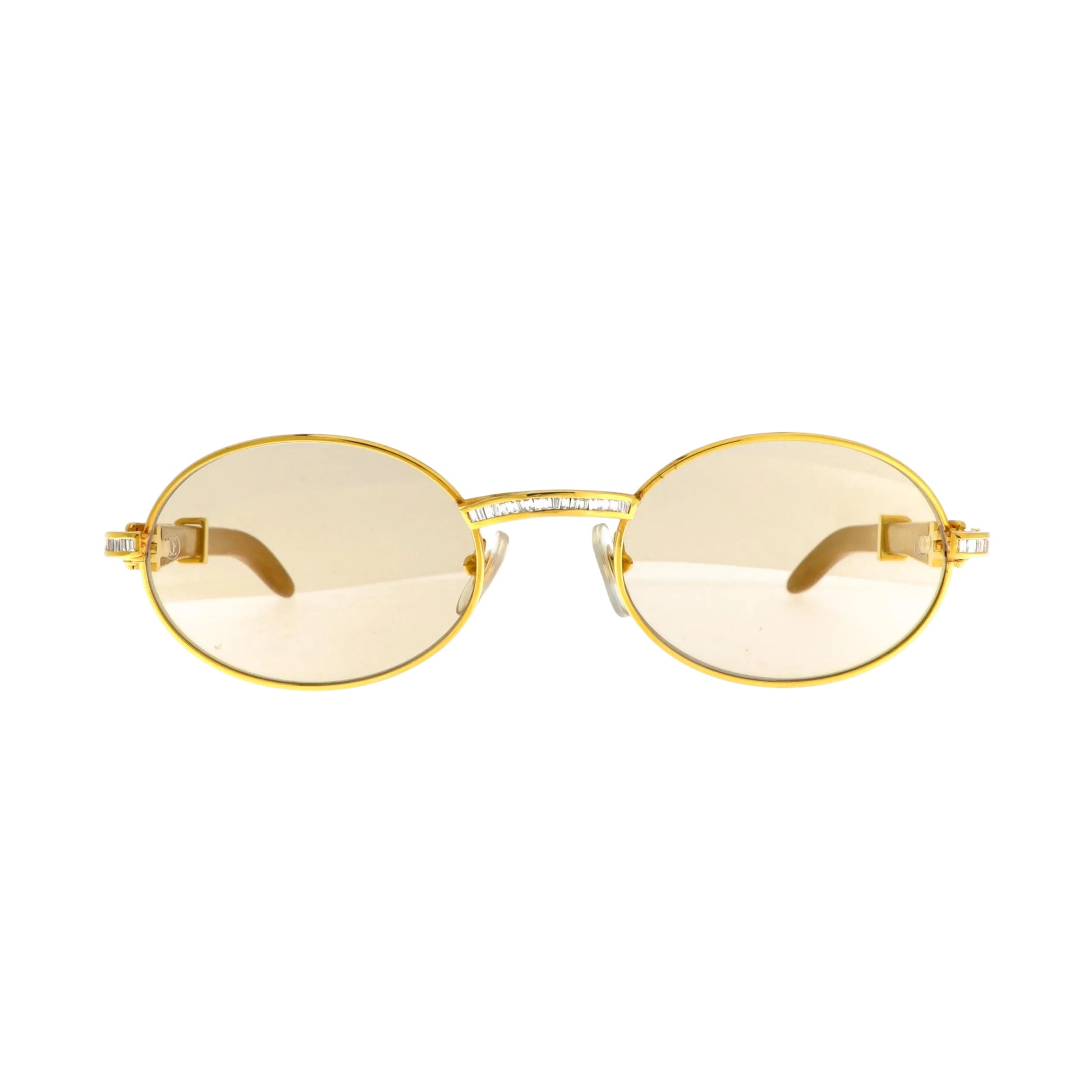 Cartier Must de Giverny sunglasses with gold front and diamond accents, featuring stylish, oversized design and dark tinted lenses.