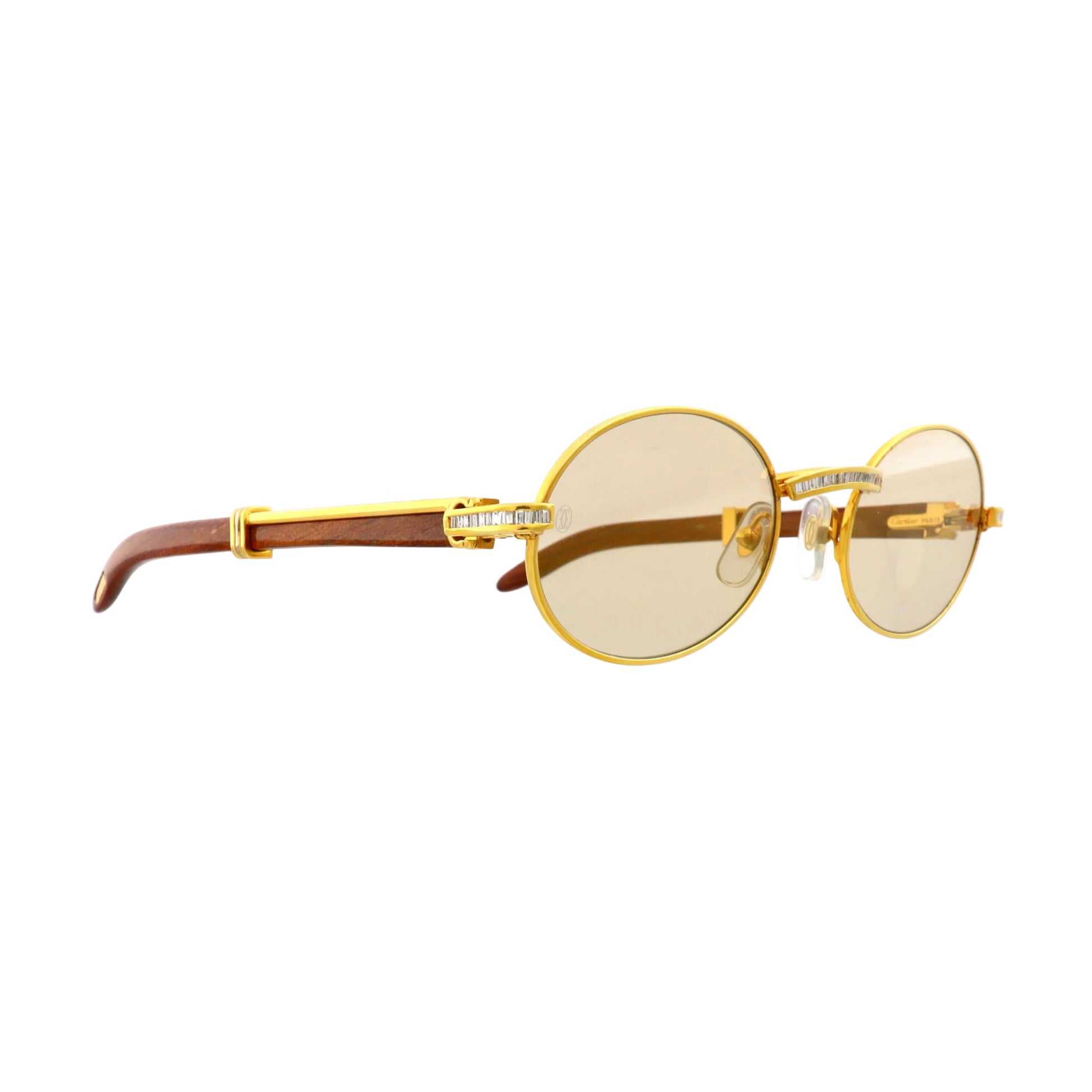 Cartier Must de Giverny sunglasses with gold accents and diamond details, showcasing stylish eyewear with elegant design.