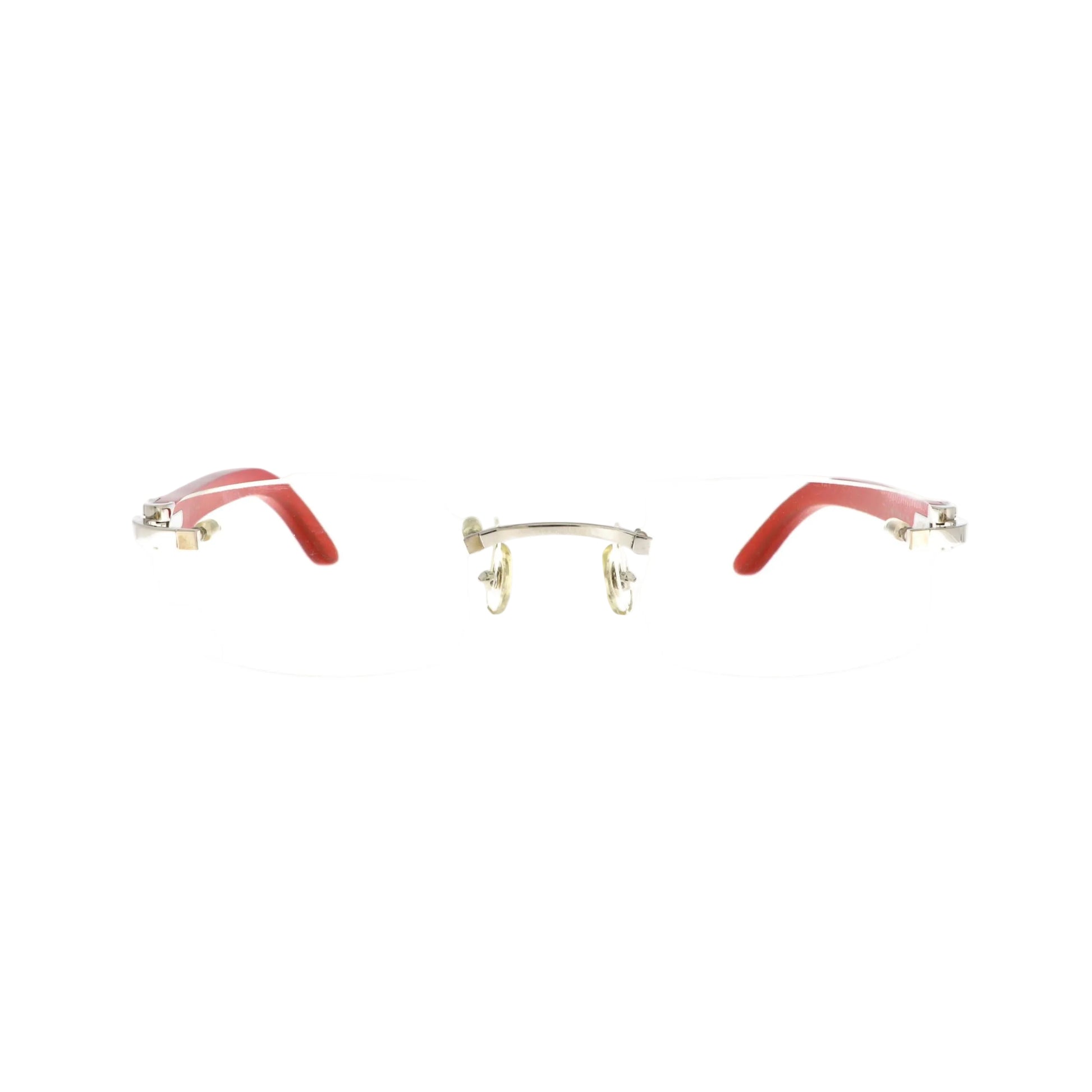 Cartier sunglasses with red platinum wood frames and dark tinted lenses, front view showcasing stylish eyewear design.