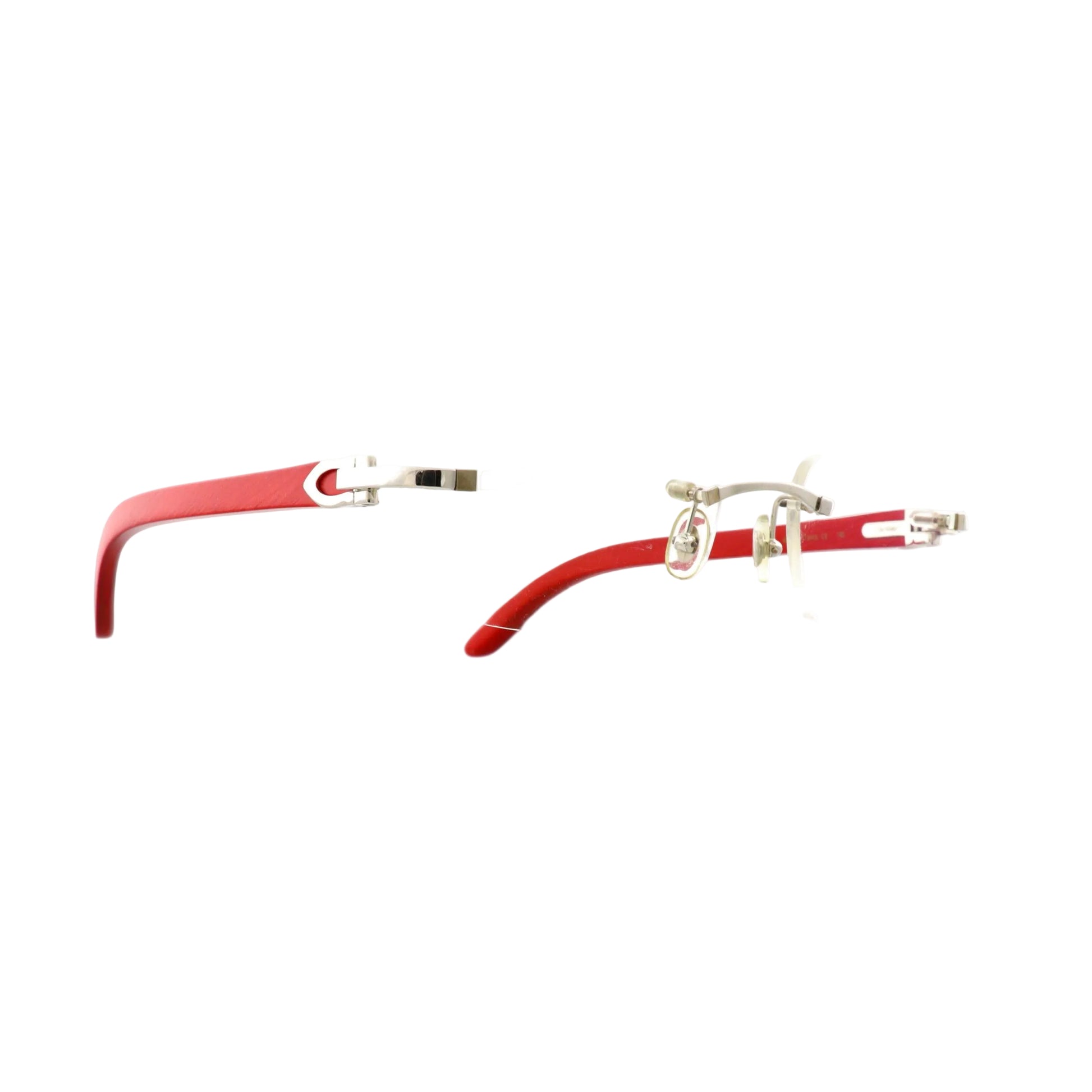 Cartier sunglasses with red platinum wood frames and dark tinted lenses, showcasing side profile and elegant design.