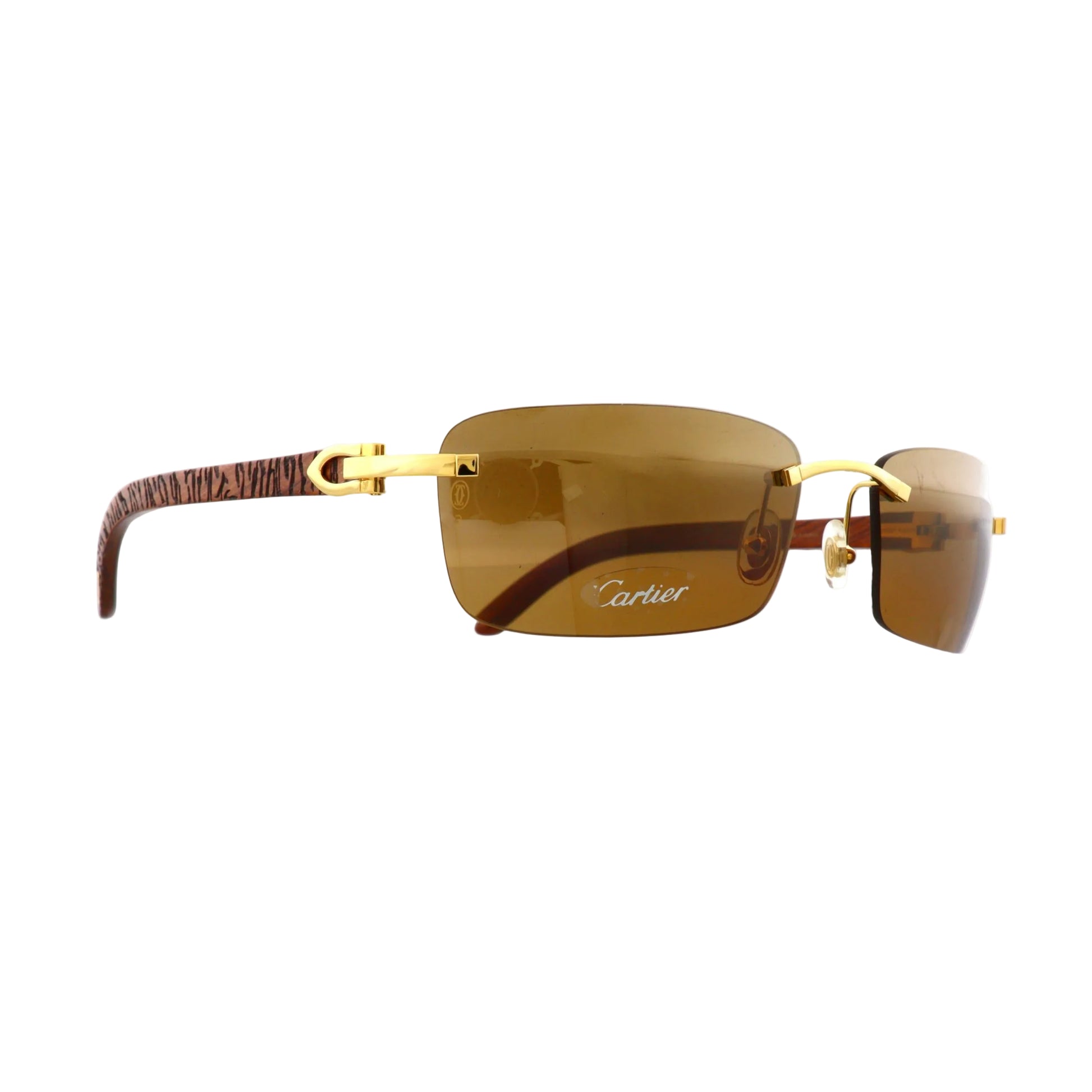 Cartier Must de sunglasses with zebra wood frames, brown lenses, and sleek design, showcasing side view.