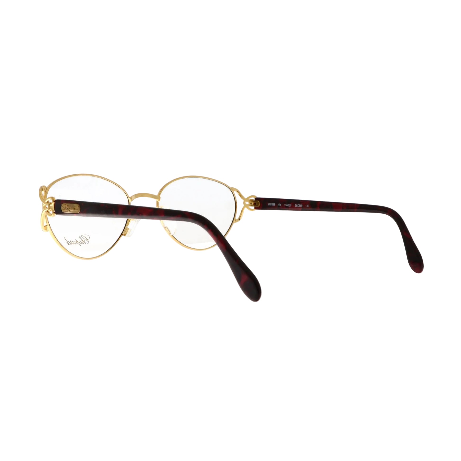 Chopard V6060 gold sunglasses with black temples and tinted lenses, stylish eyewear for sun protection and fashion.