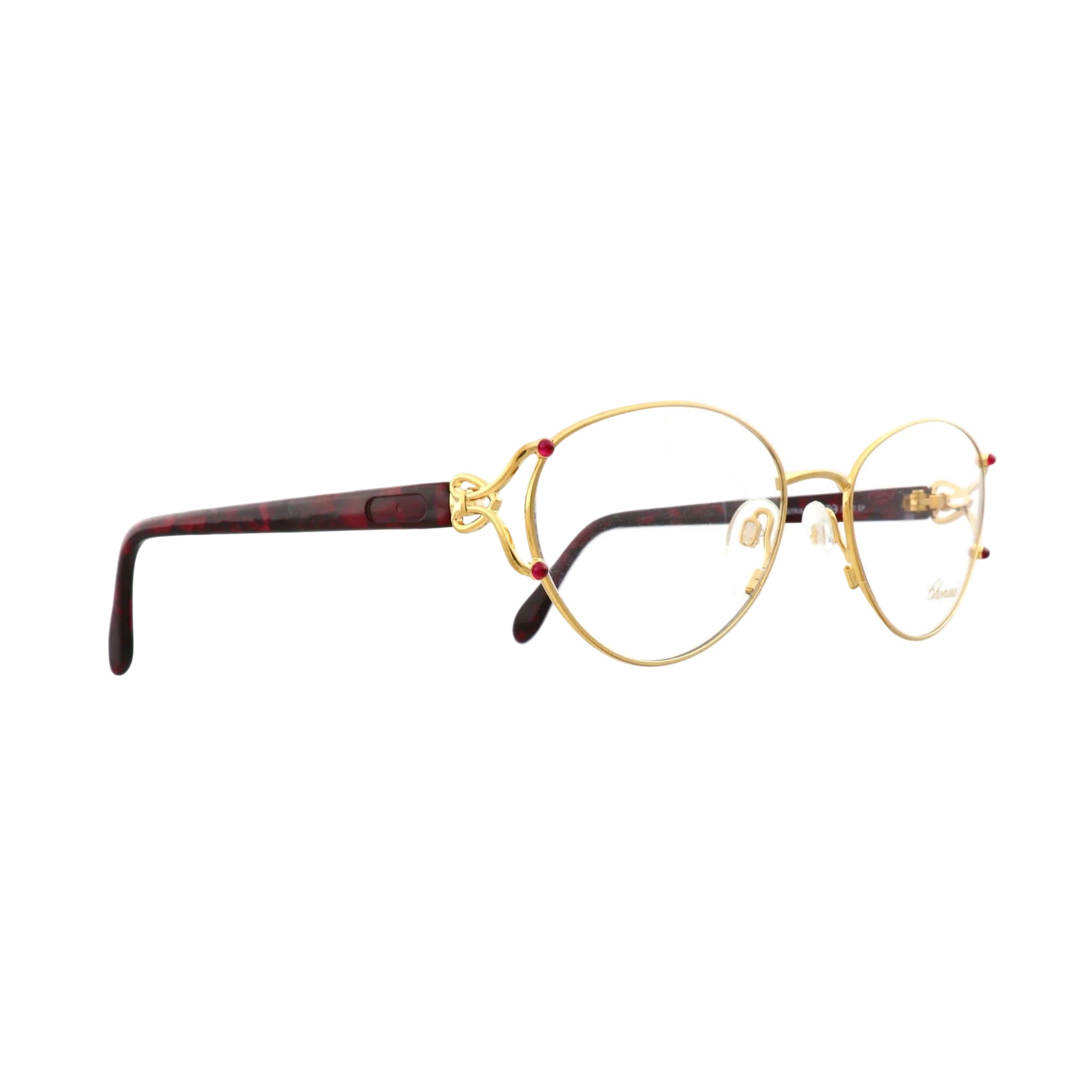 Chopard V6060 gold sunglasses with sleek frame and tinted lenses, stylish and luxurious eyewear for sun protection.