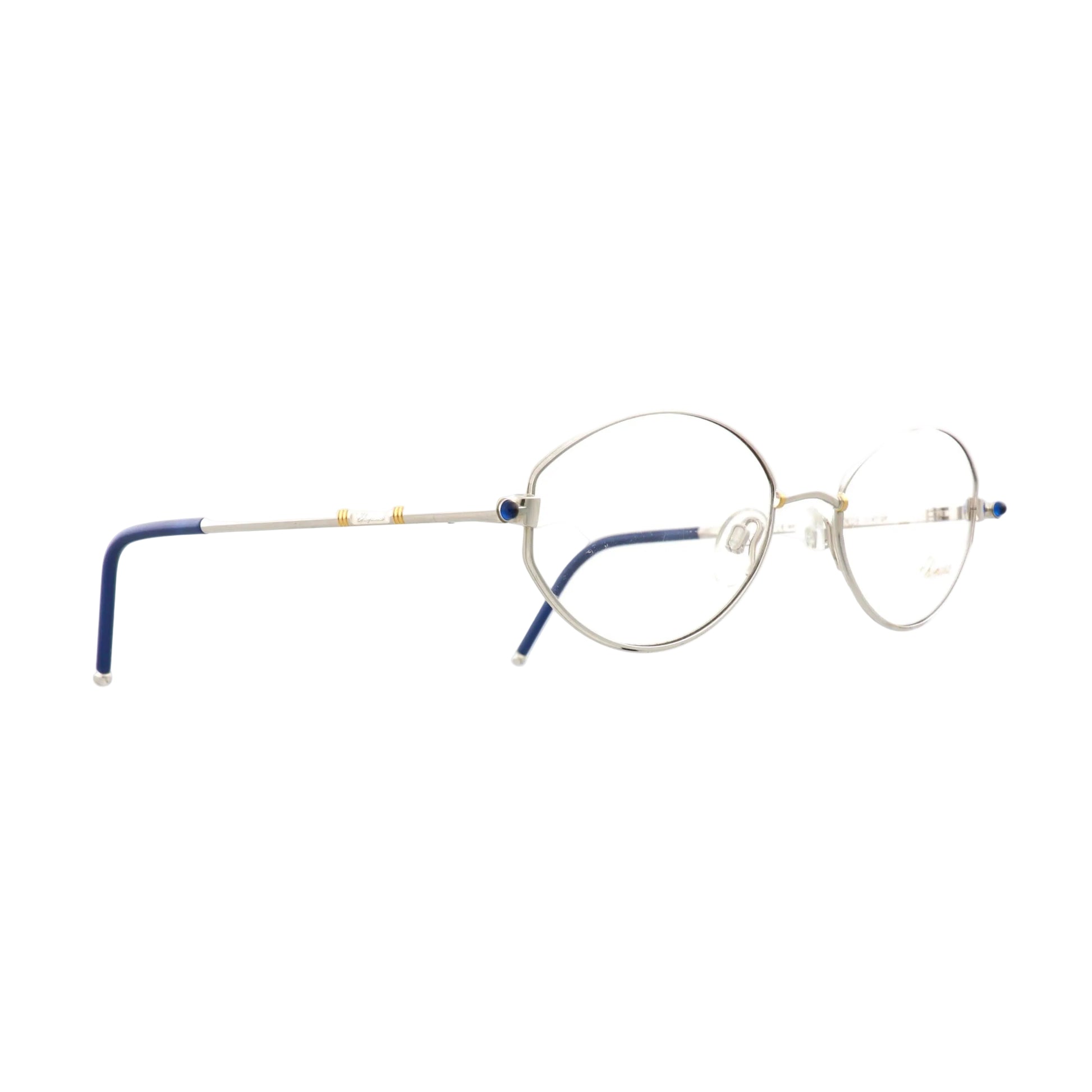 Chopard V6064 sunglasses with silver frame and dark tinted lenses, stylish and sleek design for sun protection.