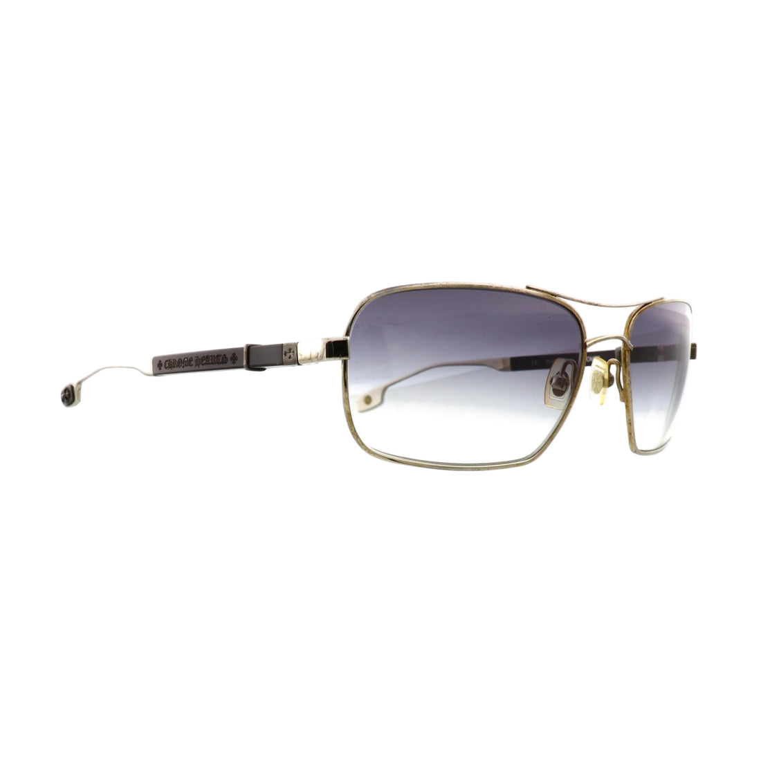 Chrome Hearts Loomer sunglasses with silver front, showcasing sleek designer eyewear with bold frame design and stylish details.