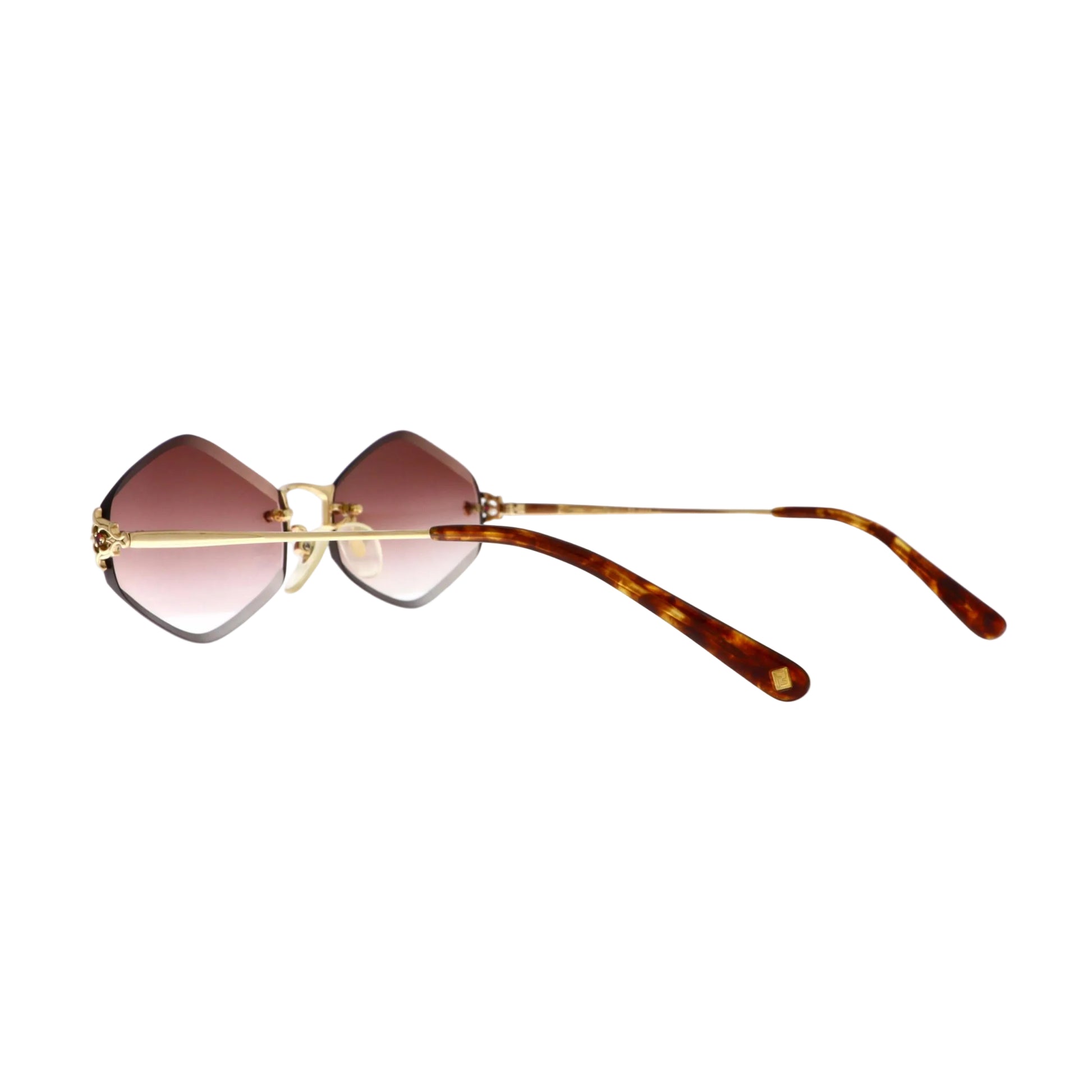 Fendi FE-9244 gold sunglasses with slim frames and dark tinted lenses, stylish and luxurious eyewear for sun protection.