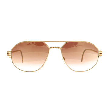 Henry Jullien Keano sunglasses with gold frame and dark lenses, stylish and modern eyewear for a sophisticated look.