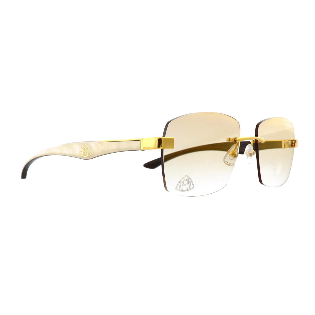 Maybach Artist III sunglasses with gold and white frames, featuring sleek, modern design and tinted lenses.
