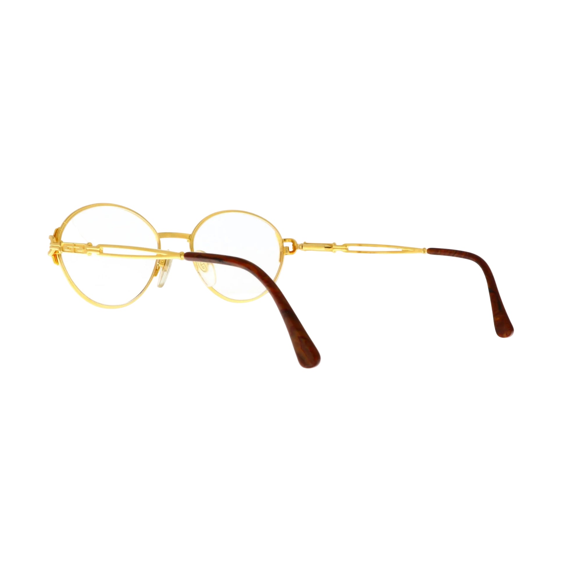 Gerald Genta by Orama D'Arte sunglasses with gold frame and dark tinted lenses, stylish and modern eyewear design.