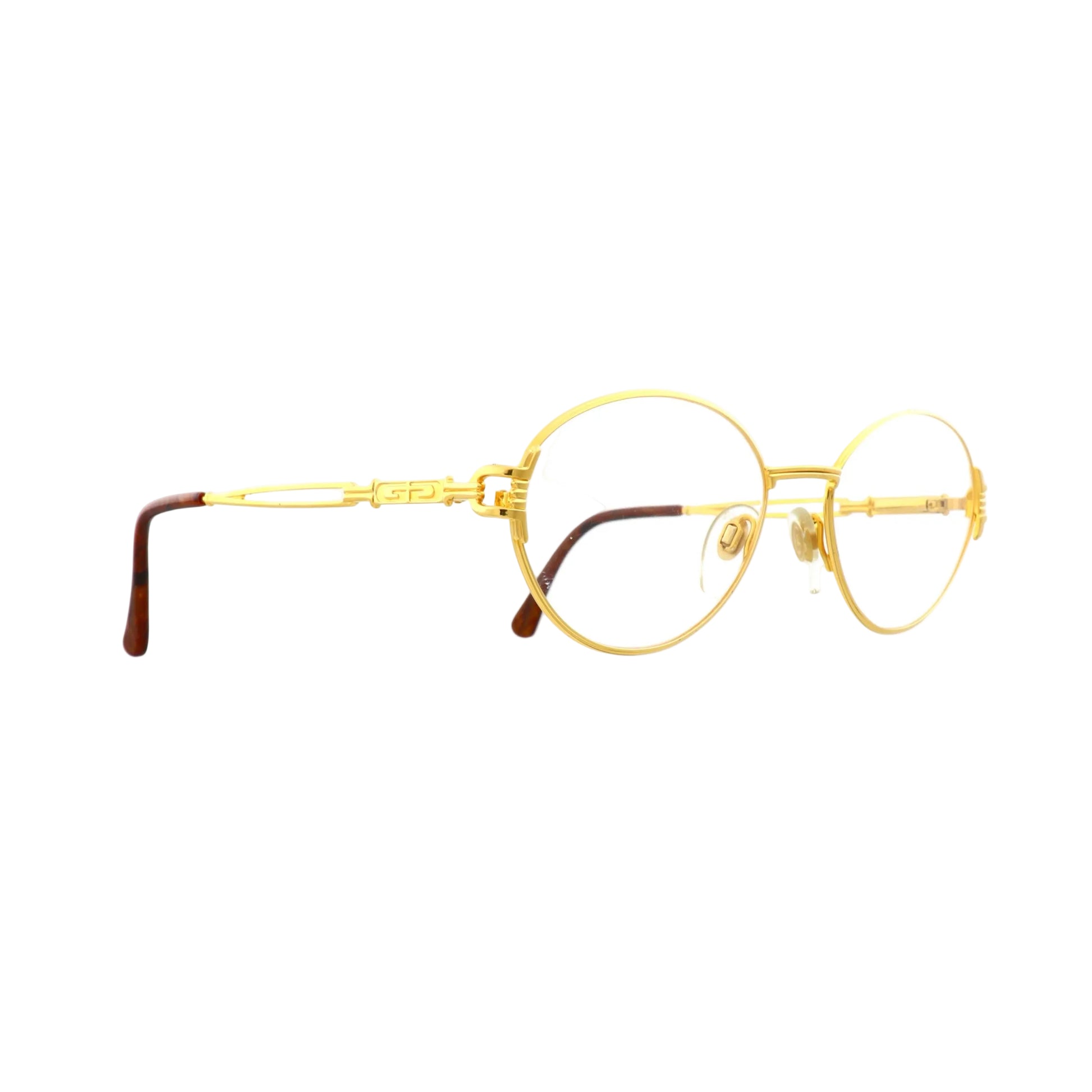 Gerald Genta d'arte sunglasses by Orama with gold frame and sleek side view, stylish and modern eyewear for fashion-forward looks.