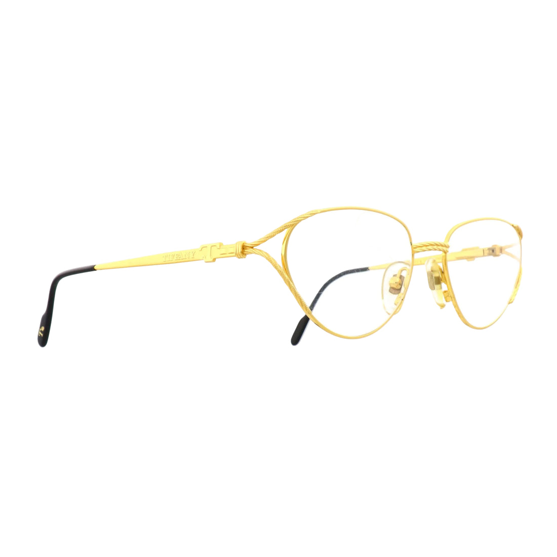 Tiffany Lunettes T360 sunglasses with gold front and dark lenses, stylish eyewear featuring sleek design and brand logo.