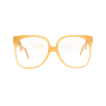 Yellow eyeglasses on a white background